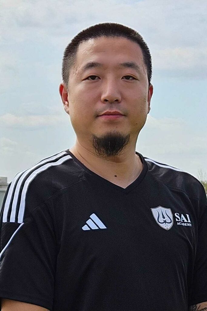 Michael-Zhang-Headshot-e1715981017965-683x1024